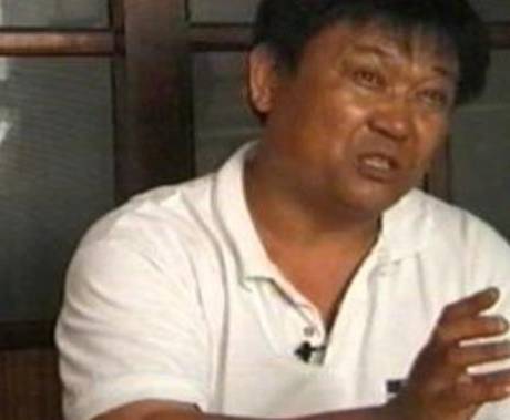 mluvící korejský muž